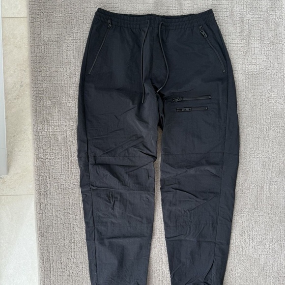 Takeaway Track Pant - Black - Retail $149 - Picture 1 of 5